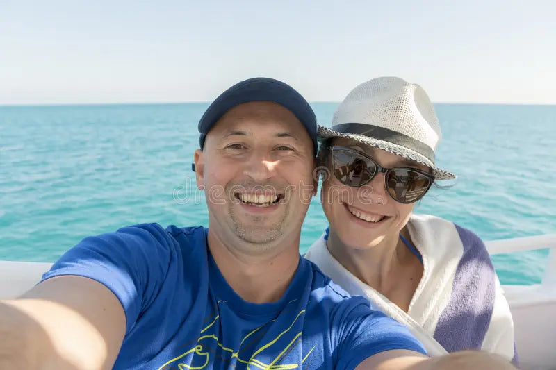 files/happy-middle-aged-couple-taking-selfie-yacht-beautiful-deck-floating-sea-sailing-technology-tourism-travel-people-150501038.webp